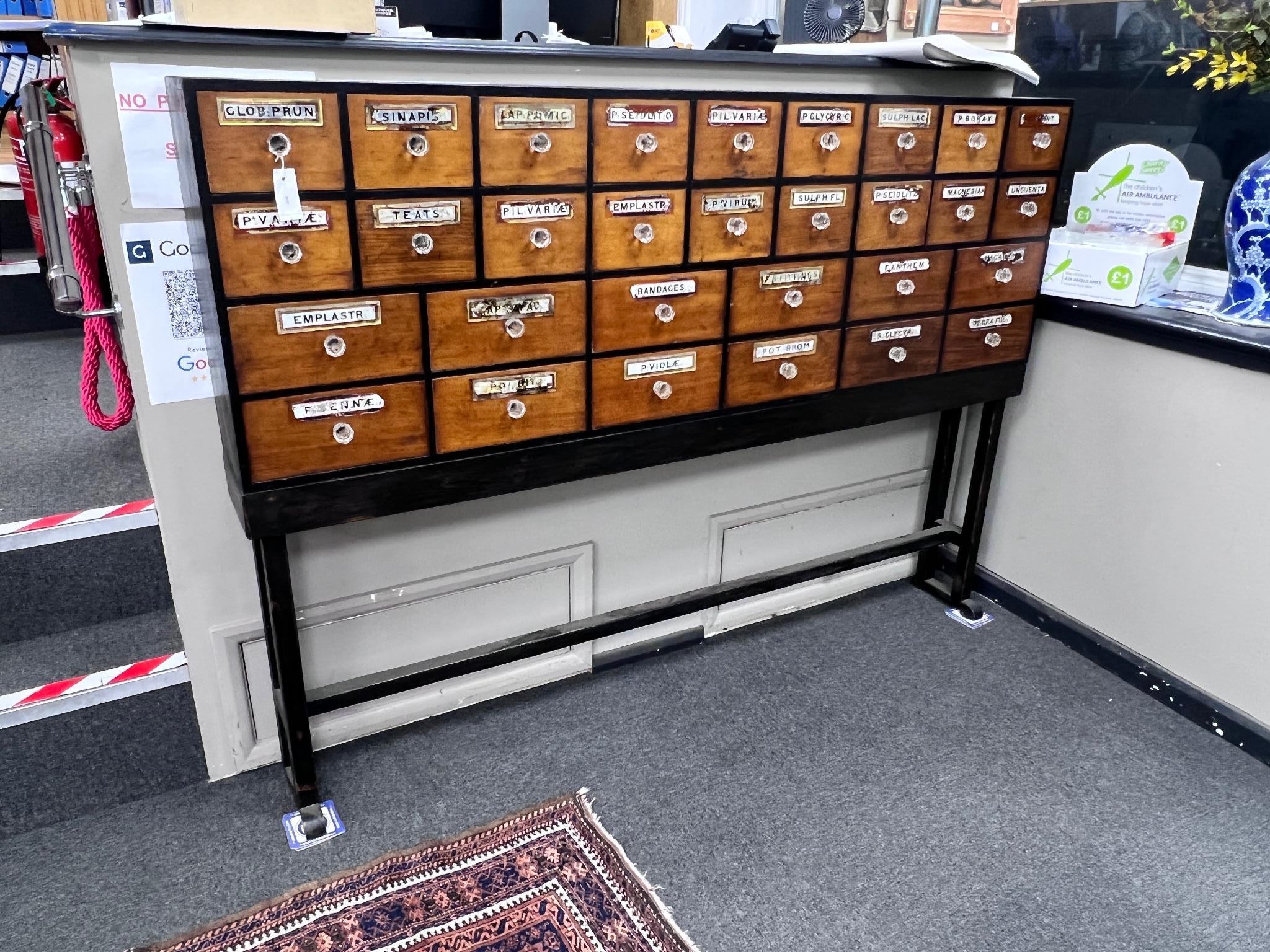 A Victorian part ebonised mahogany 30 drawer apothecary cabinet with faceted glass handles, on later stand, length 183cm, depth 23cm, height 131cm